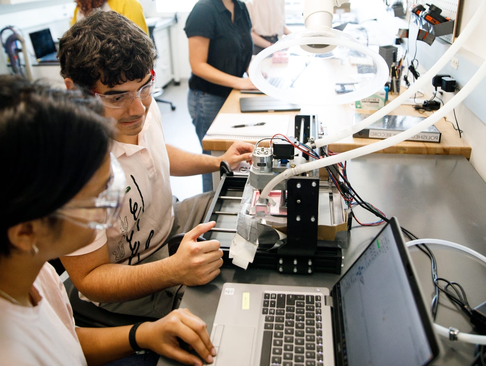 ASU students working in a lab as part of the School of Sustainability undergraduate research program